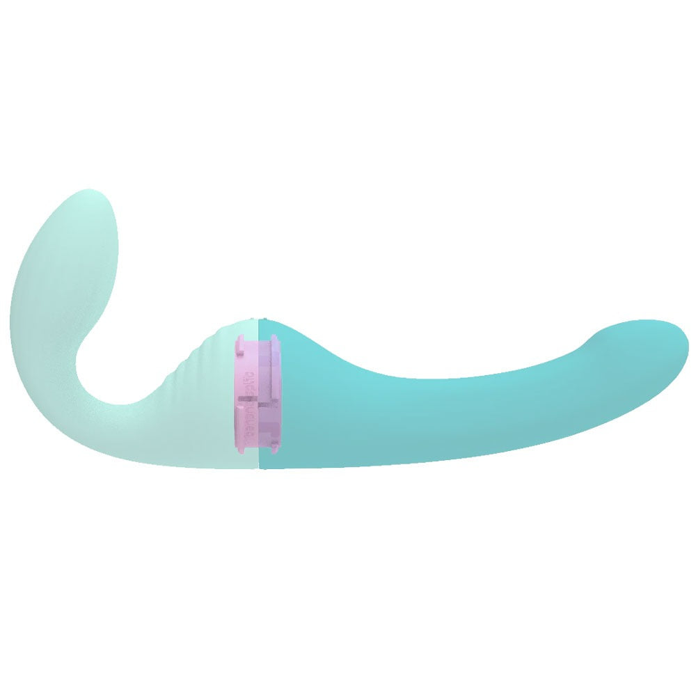 Banana Split customizable couples strapless strap on vibrator with dollop side, and banana side, connected with interior locking mechanism seen to show how they connect