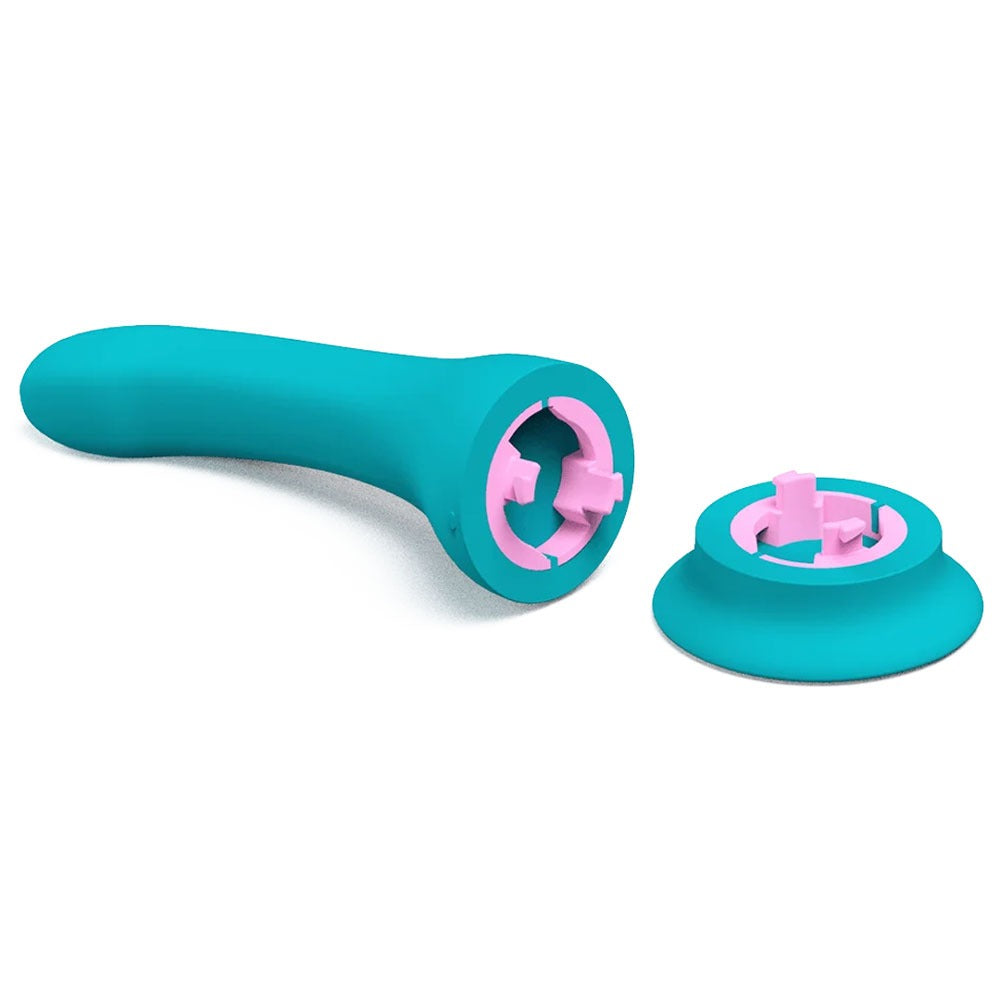 Banana Split customizable couples strapless strap on vibrator banana, with it's included suction base to use as a stand alone vibrator, disconnected, with interior locking mechanism exposed