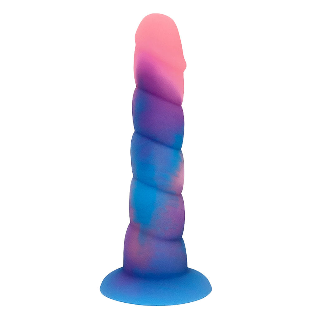 Nexus Loli swirl ribbed silicone dildo in Aurora glow, a pink, blue and purple mix, flat on its suction base, from the side