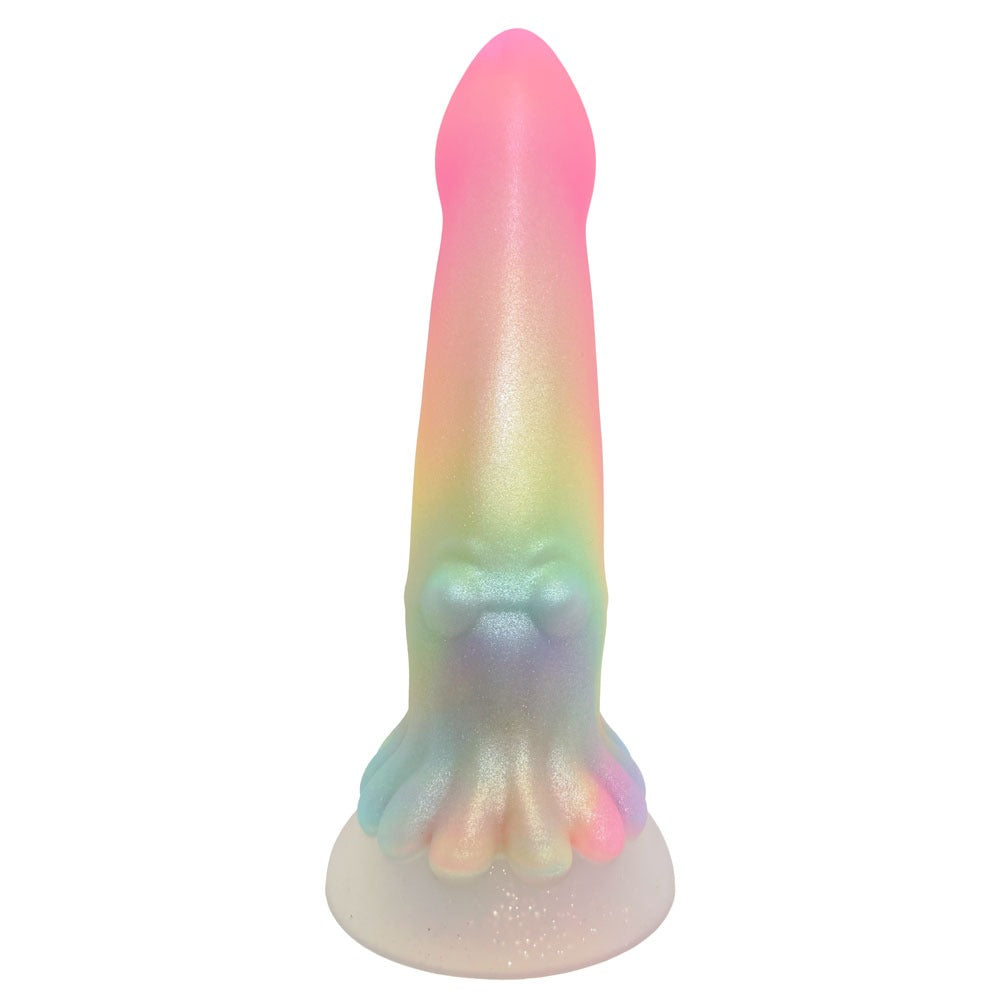 Nexus Silicone fantasy squid dildo in rainbow shimmer flat on its suction base from the back with the squid looking out