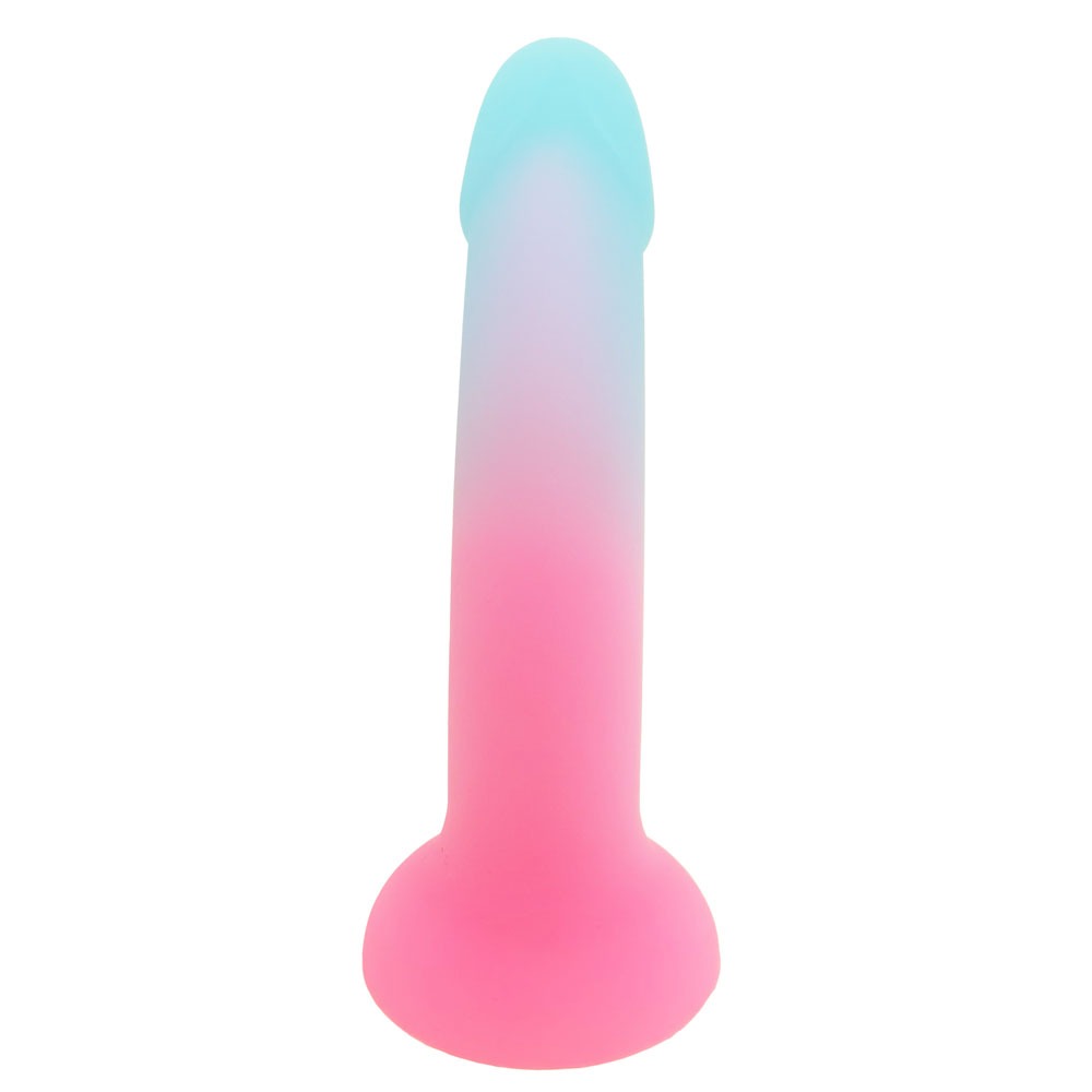 Nexus Sol Sweet tart pink and blue silicone dildo, flat on its suction base, from the back