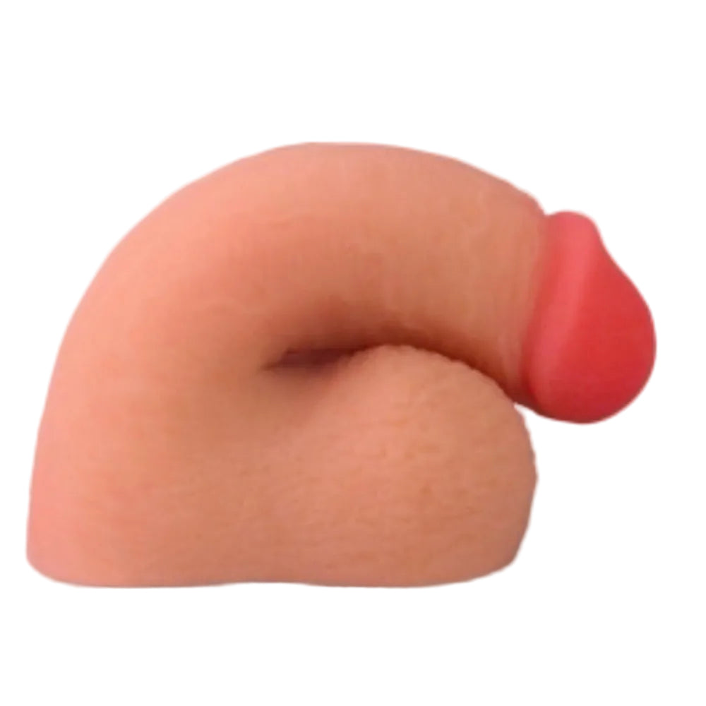 Love toy 5 inch dual layer TPE packing penis form the side in a flaccid position
