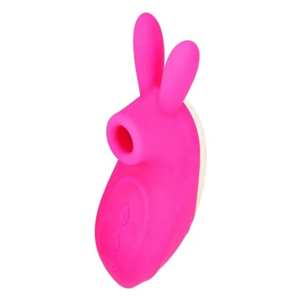 pink silicone bunny  shaped clitoral vibrator with licking tongue and vibrating ears from the front top and side