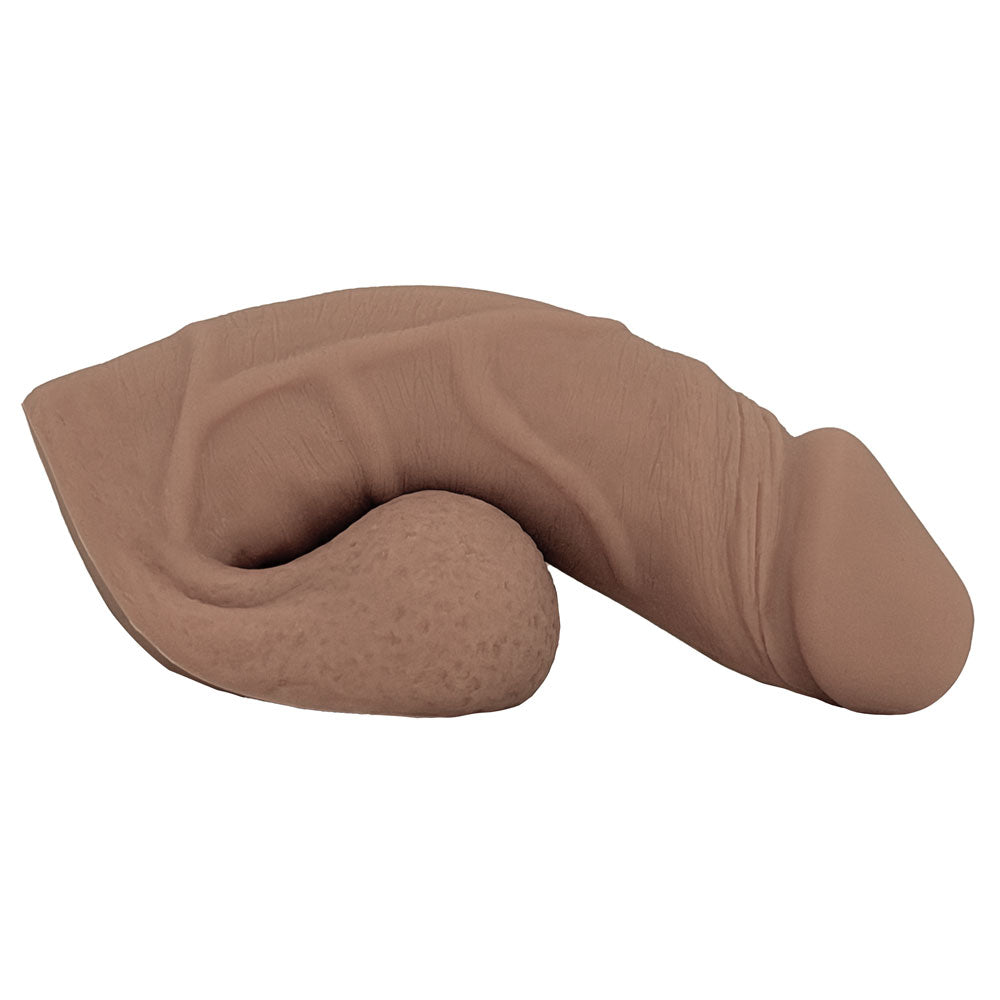 Freeform Medium 5 inch silicone soft  ftm packer, in caramel color from the side, sitting on the balls as a base