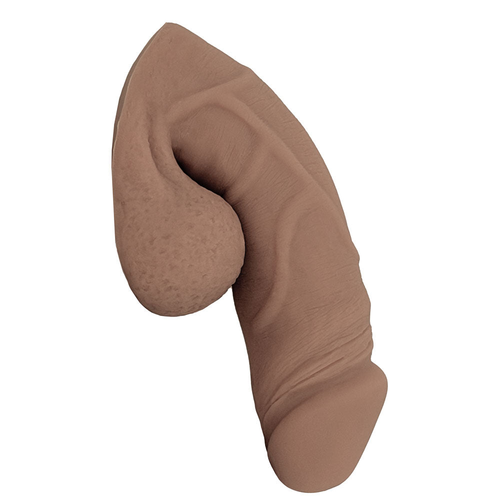 Freeform Medium 5 inch silicone soft  ftm packer, caramel colors from the side in the flaccid packed position