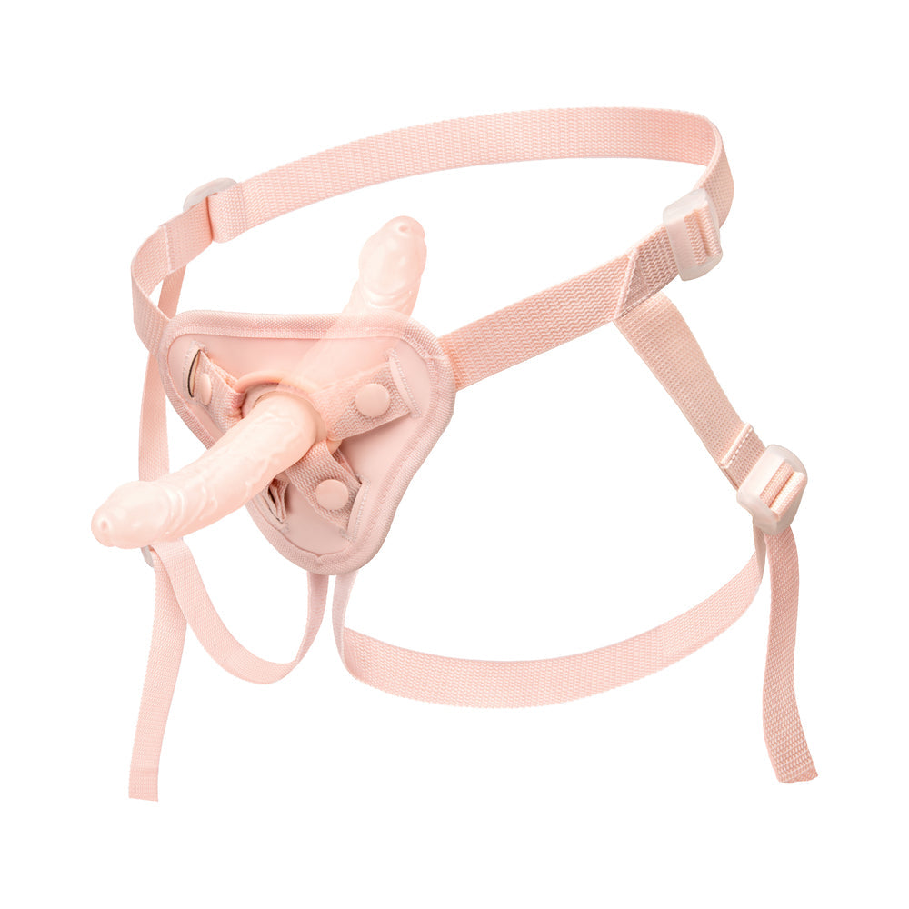 Together Toys Nudefit Adjustable Vanilla Strap on harness, form the front,  and side with a double ended dildo inserted into harness