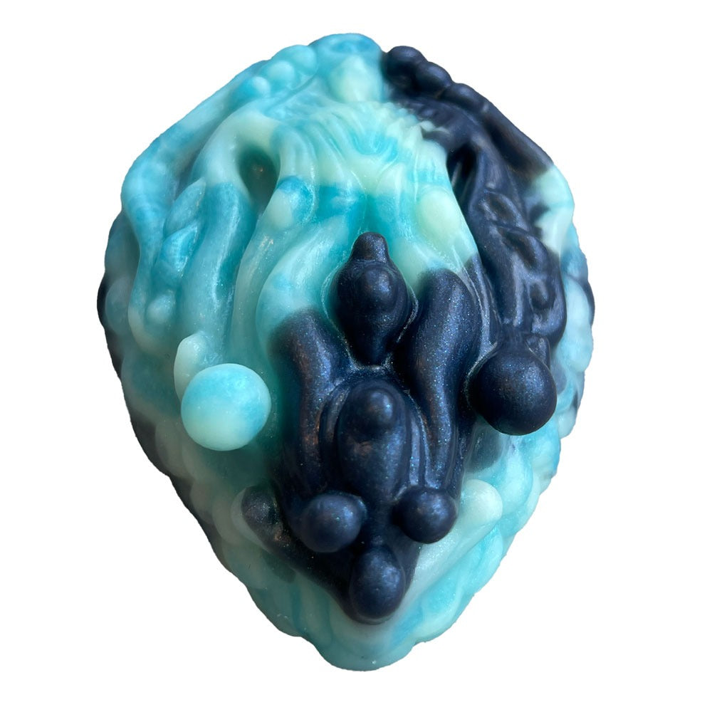 Pris Toys Tribble fantasy silicone dildo cushion with vibe hole from the front in Night tide, a blend of blues